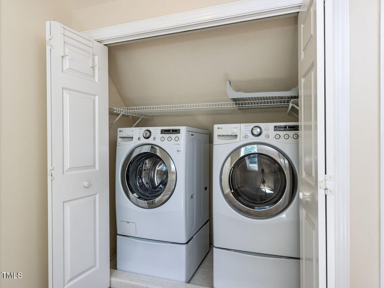 315 King George Loop Cary, NC 27511 - Photo 26 of 39 a utility room with dryer and washer