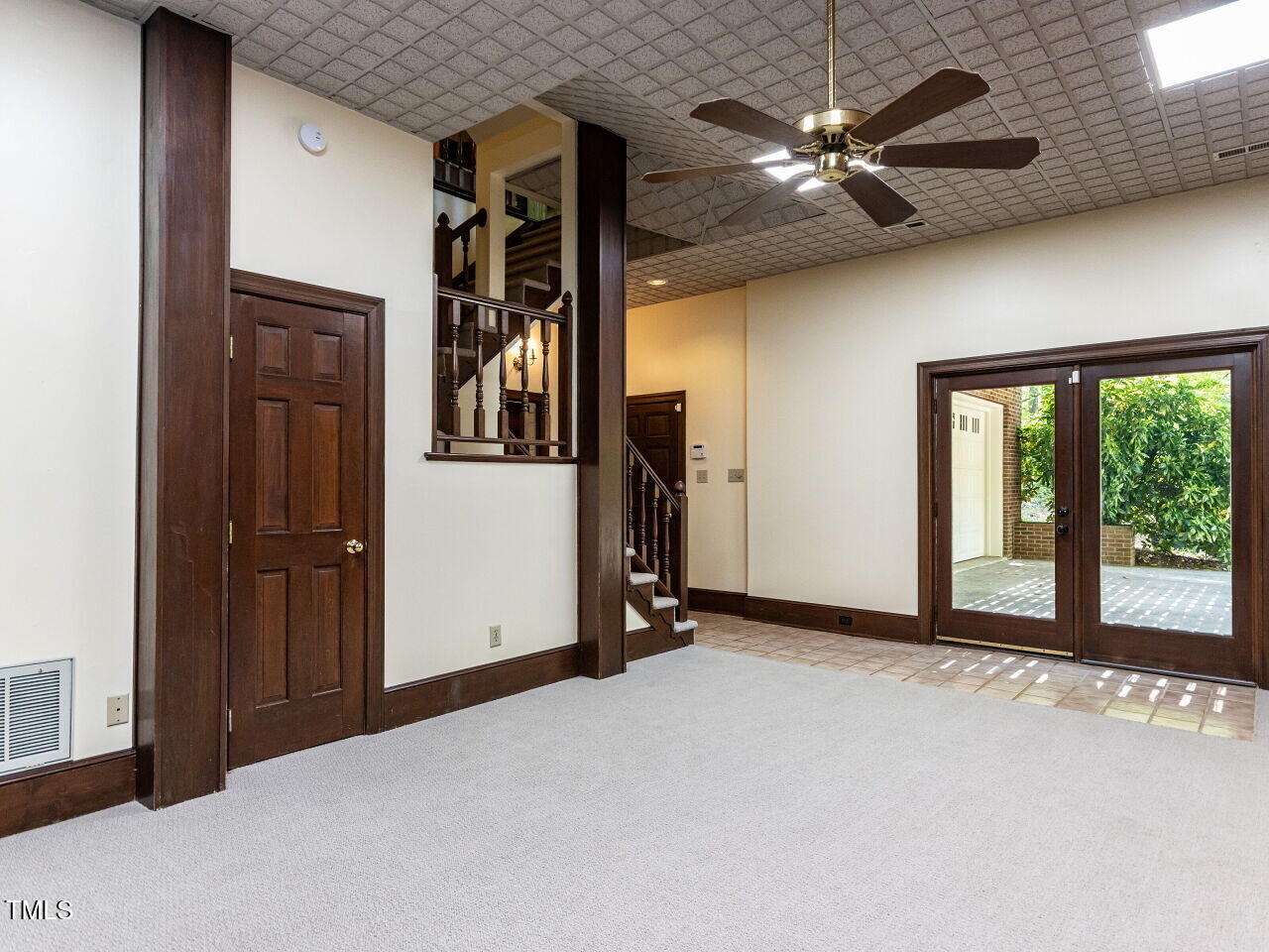 315 King George Loop Cary, NC 27511 - Photo 31 of 39 a view of a livingroom with a ceiling fan and window