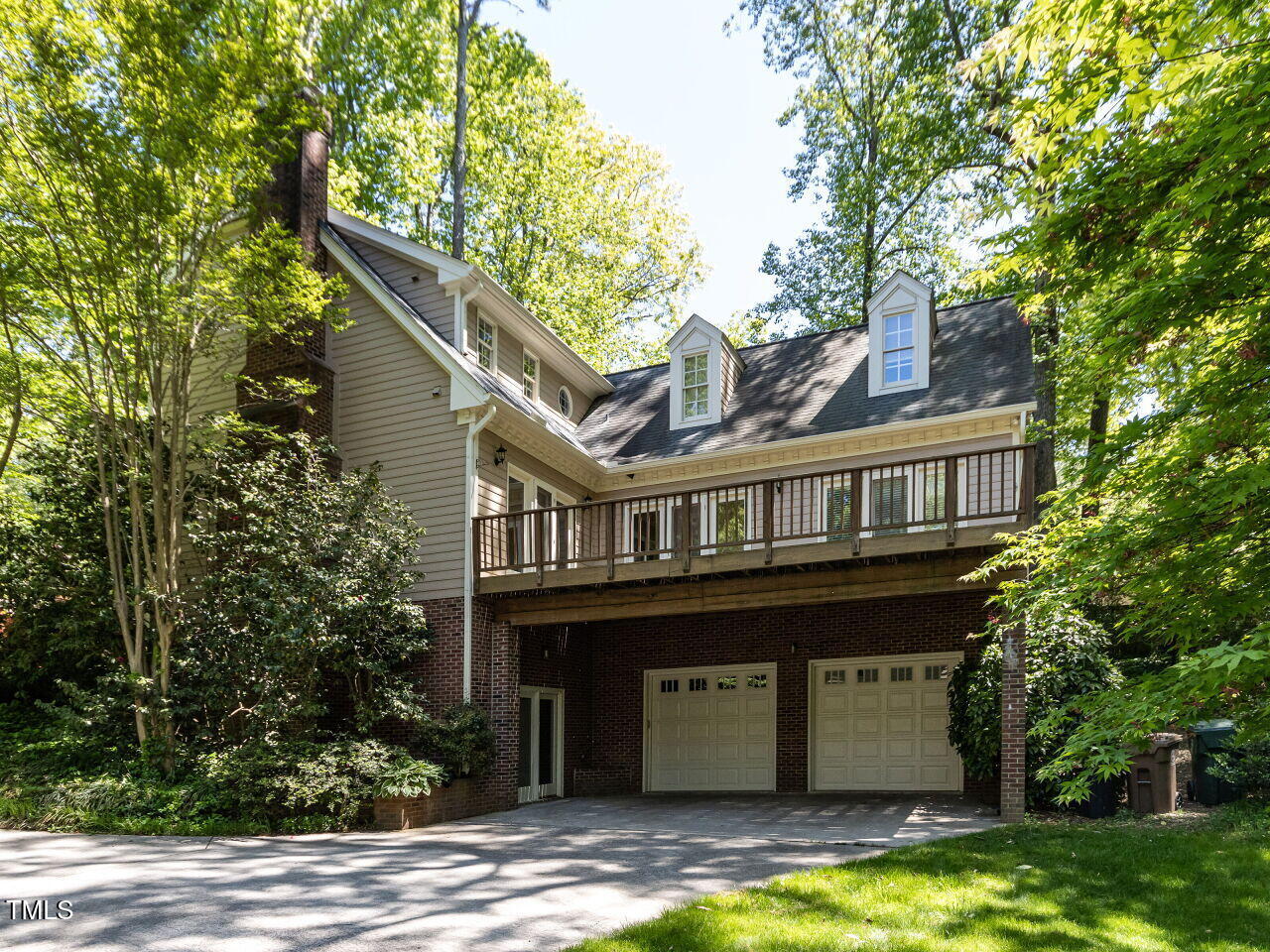 315 King George Loop Cary, NC 27511 - Photo 35 of 39 a view of a house with a large window and large tree