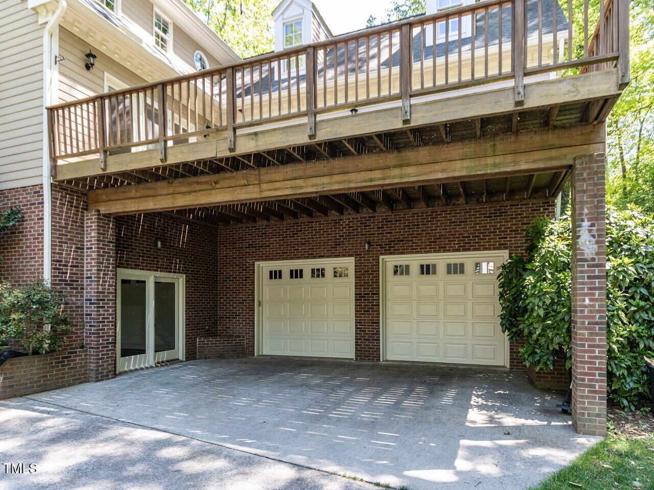 315 King George Loop Cary, NC 27511 - Photo 38 of 39 a front view of a building with a garage