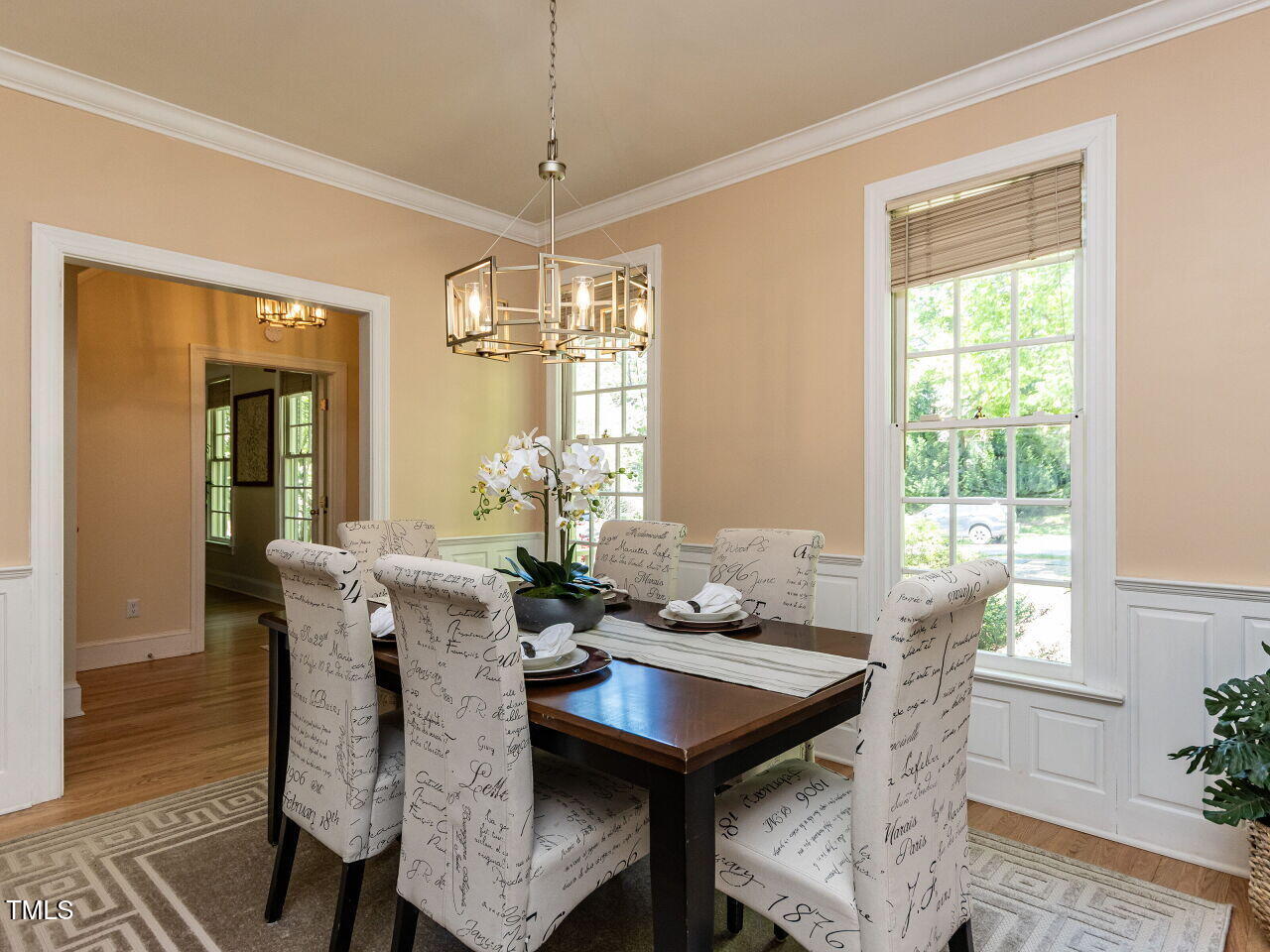 315 King George Loop Cary, NC 27511 - Photo 4 of 39 a view of a dining room with furniture window and wooden floor