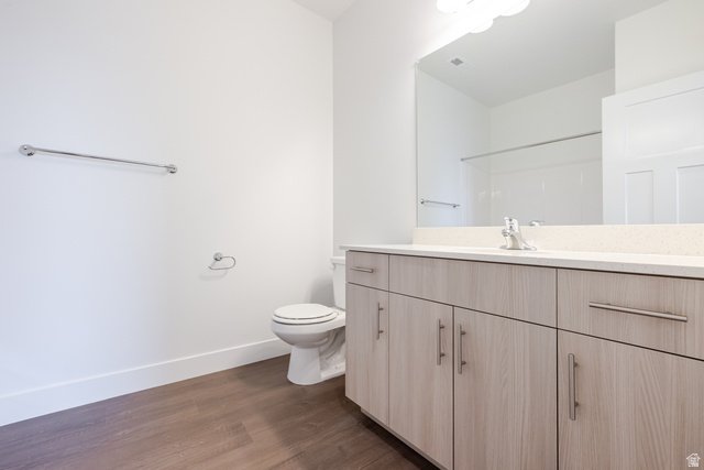 693 West 4500th South, Unit O302 Mapleton, UT 84664 - Photo 6 of 16 Full bath with vanity and dark wood-style floors