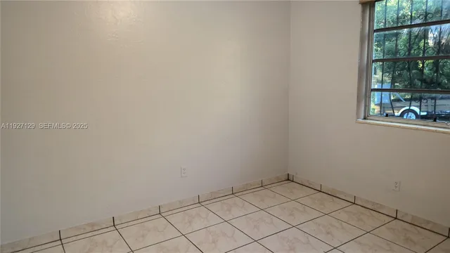 a view of a bathroom from the hallway