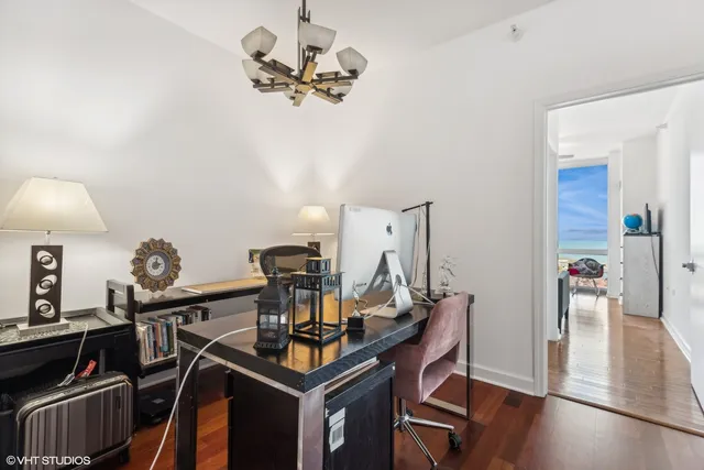 a view of a workspace with furniture