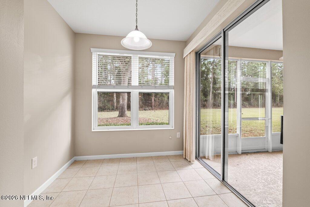 8757 Little Swift Circle, Unit 22F Jacksonville, FL 32256 - Photo 23 of 46 a view of an empty room with a window