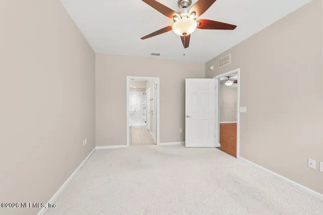 a bathroom with a double vanity sink mirror double and shower