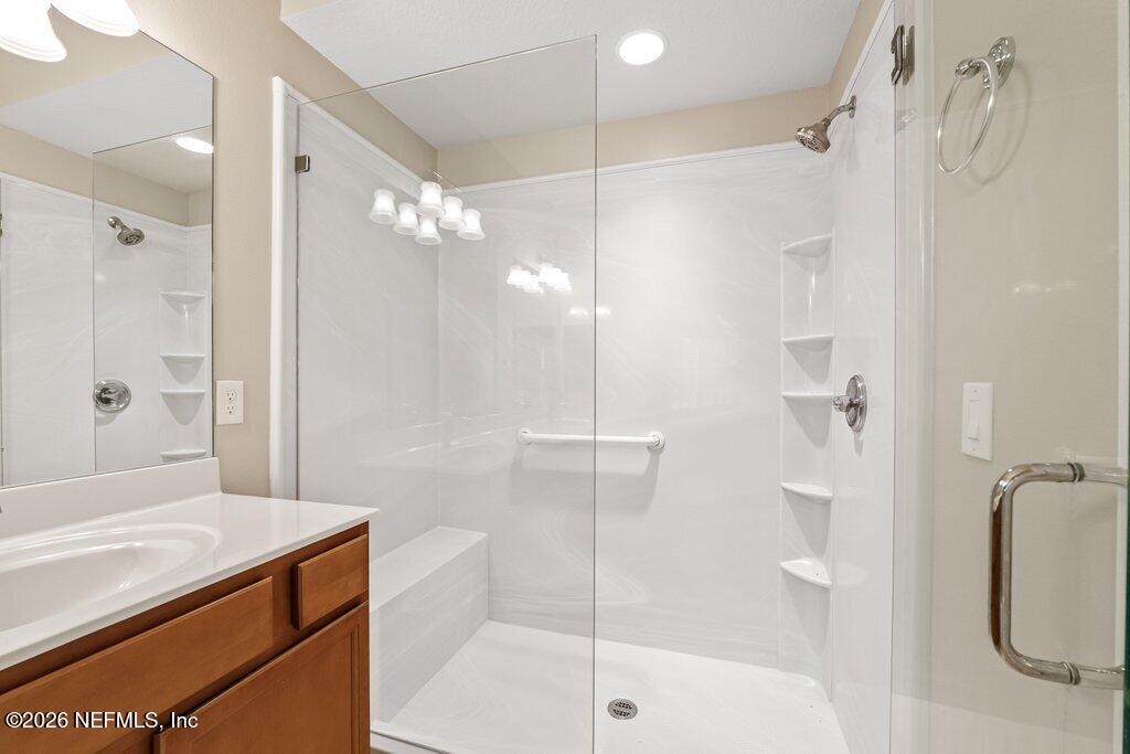 8757 Little Swift Circle, Unit 22F Jacksonville, FL 32256 - Photo 31 of 46 a bathroom with a shower and a sink
