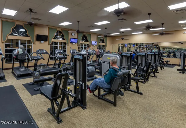 a room with lots of gym equipment