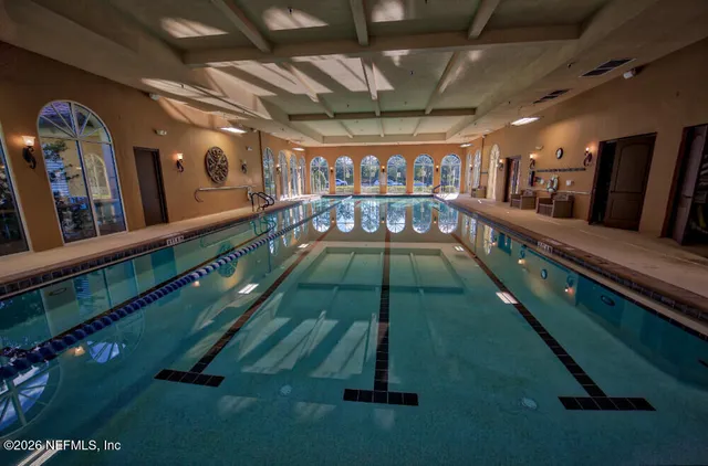 a view of a chairs and table in a room