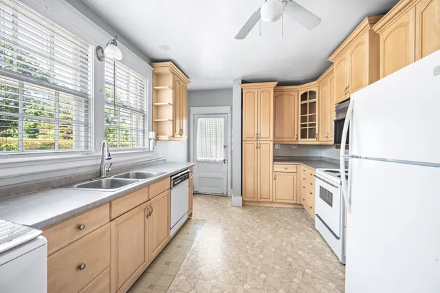 a bathroom with a sink a mirror and a bathtub
