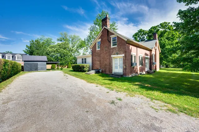 a picture of a bench in front of a door