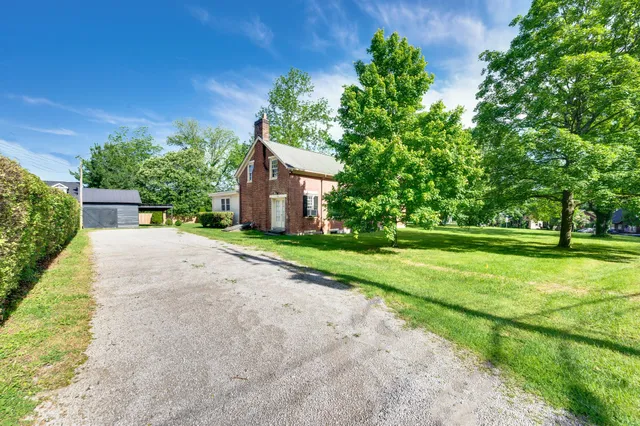 a picture of a room with a white wall and a picture of the wall