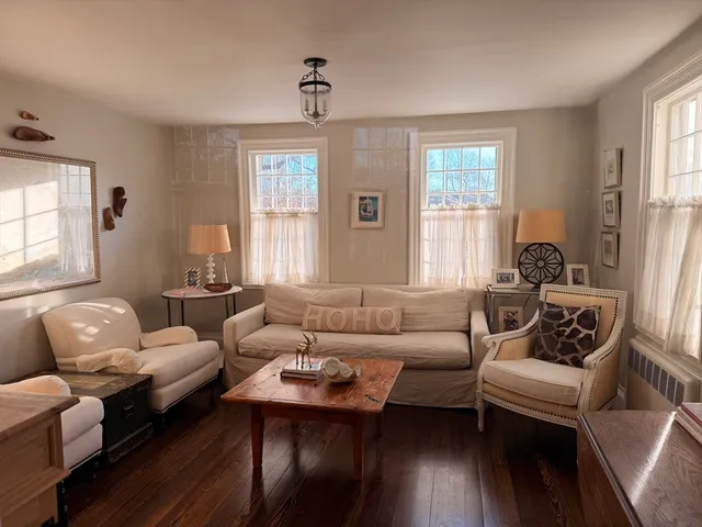 a bed room with a bed and a window