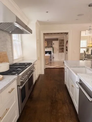 a kitchen with a stove and a sink