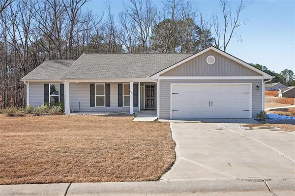 front view of house with a yard