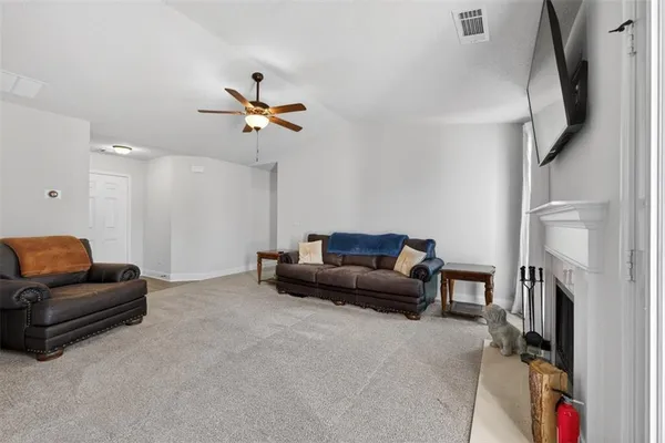 a living room with furniture and a couch