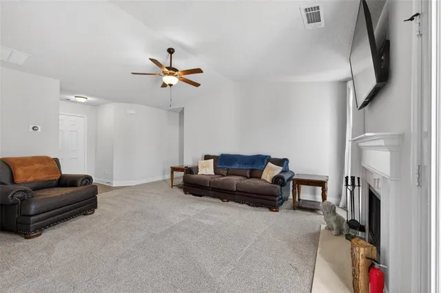 a living room with furniture and a couch