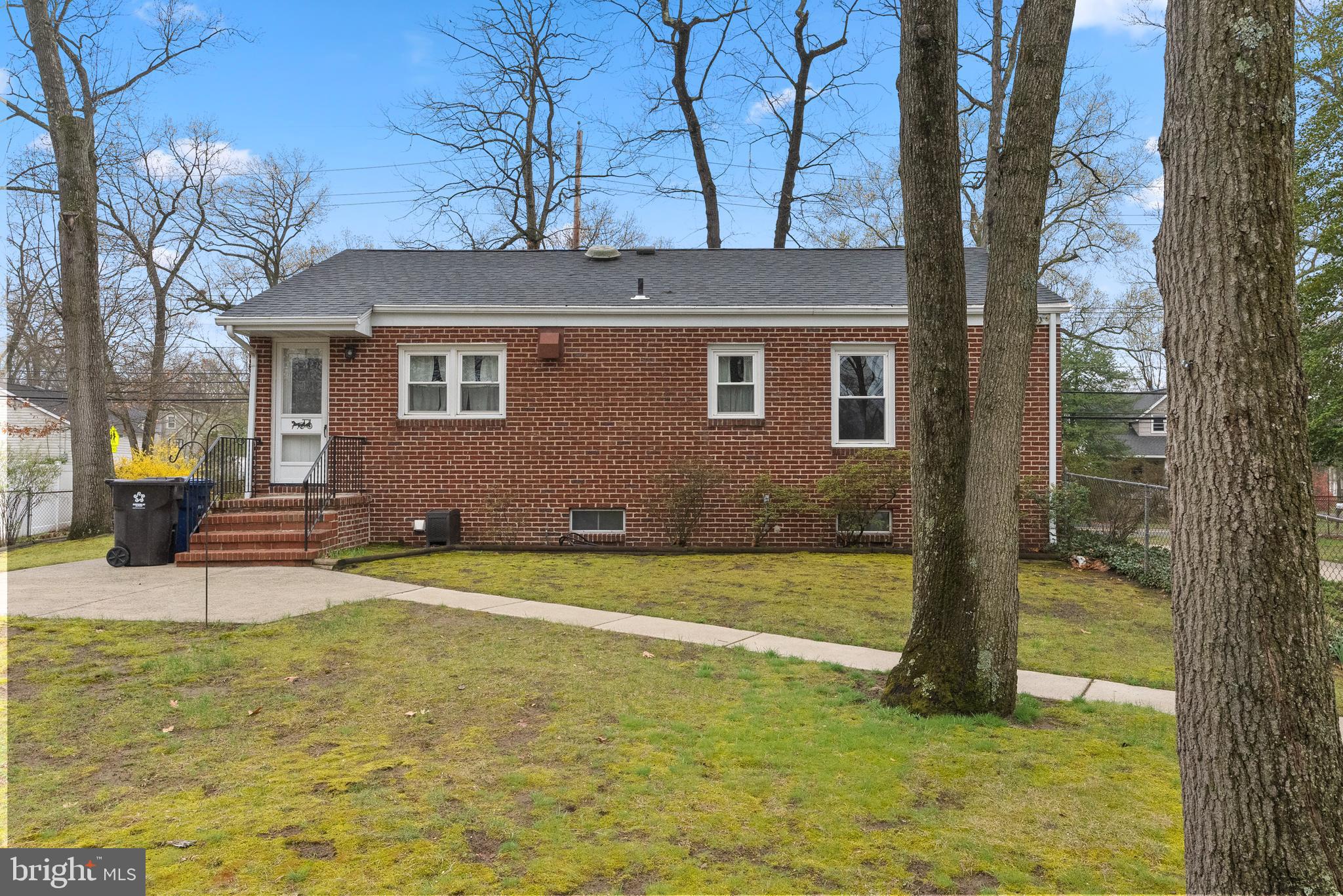 1155 South Fairview Street Delran, NJ 08075 - Photo 1 of 24 a view of pool with lawn chairs and iron fence
