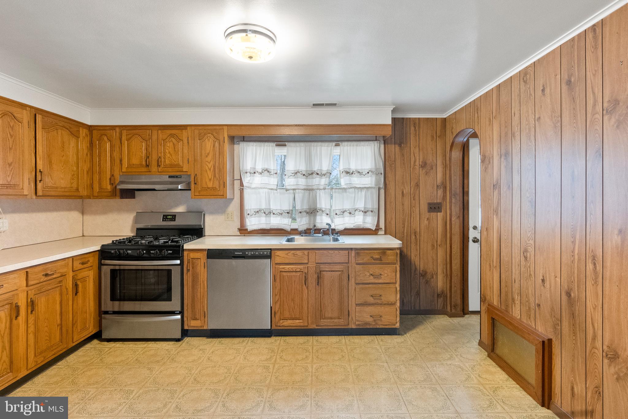 1155 South Fairview Street Delran, NJ 08075 - Photo 11 of 24 a kitchen with stainless steel appliances granite countertop a stove and a refrigerator