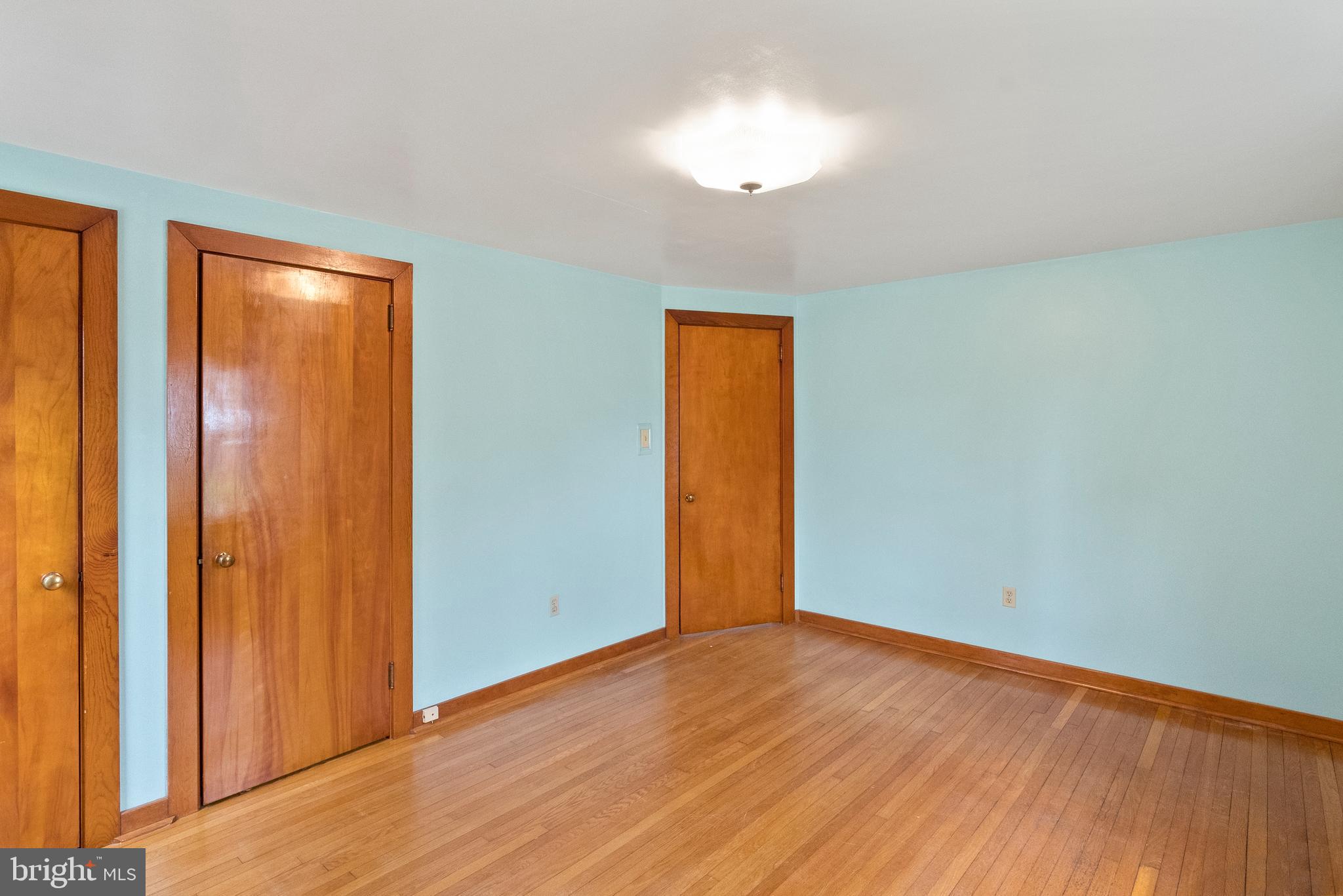 1155 South Fairview Street Delran, NJ 08075 - Photo 13 of 24 an empty room with wooden floor and closet area