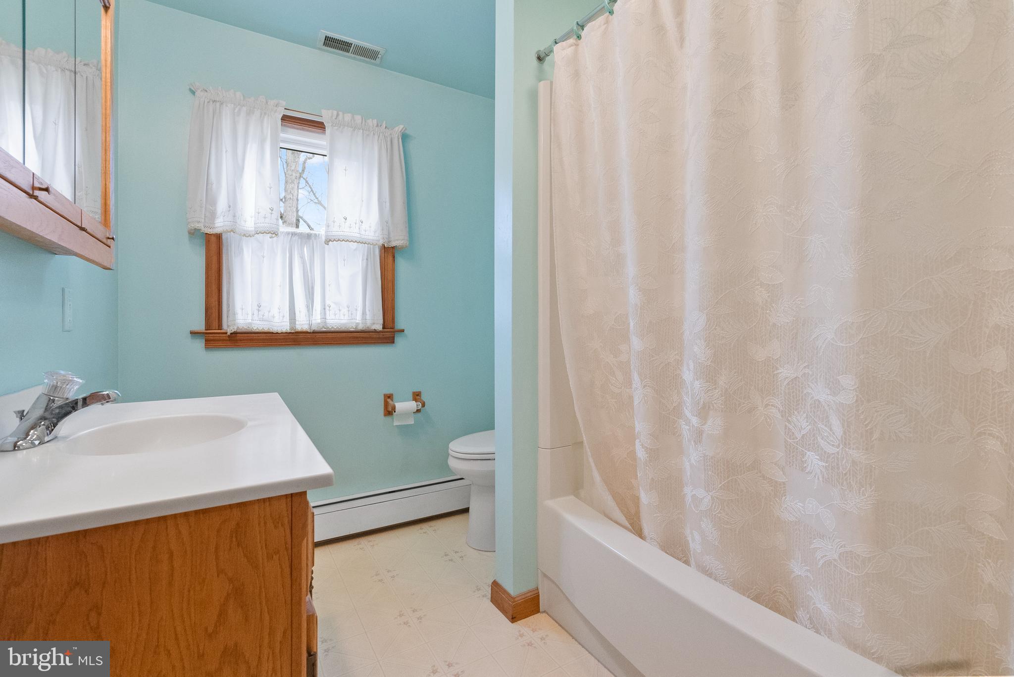 1155 South Fairview Street Delran, NJ 08075 - Photo 17 of 24 a bathroom with a sink a toilet and a bathtub