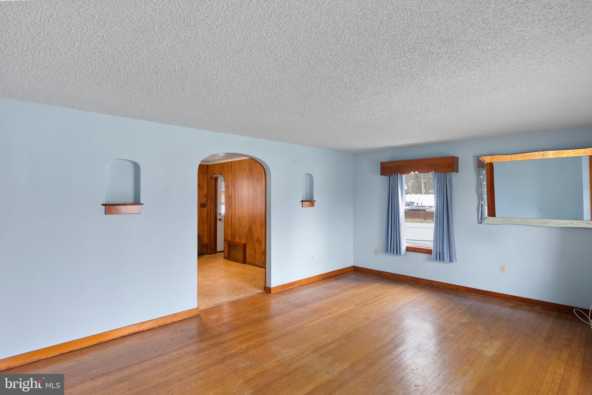 1155 South Fairview Street Delran, NJ 08075 - Photo 6 of 24 an empty room with wooden floor and windows