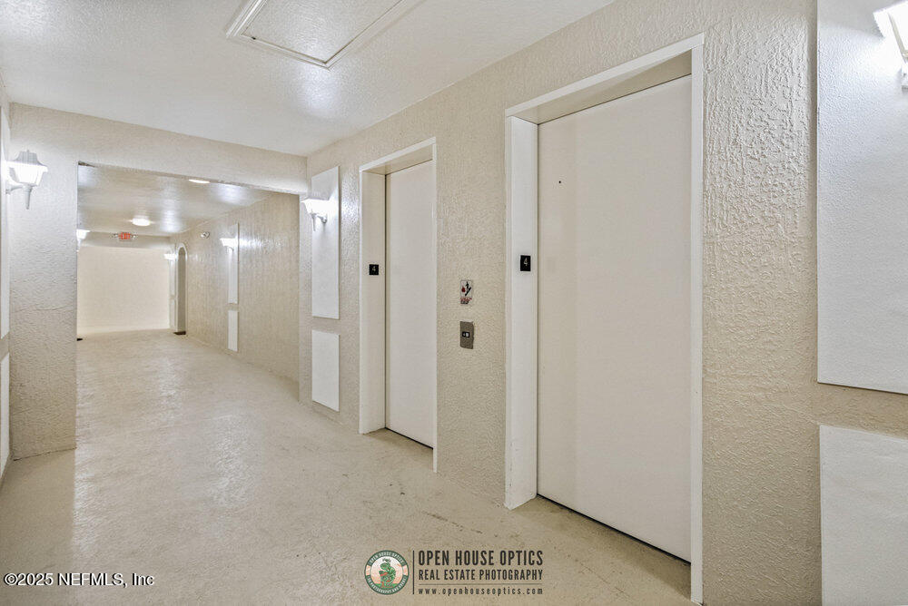 7801 Point Meadows Drive, Unit 3209 Jacksonville, FL 32256 - Photo 26 of 34 a view of a hallway