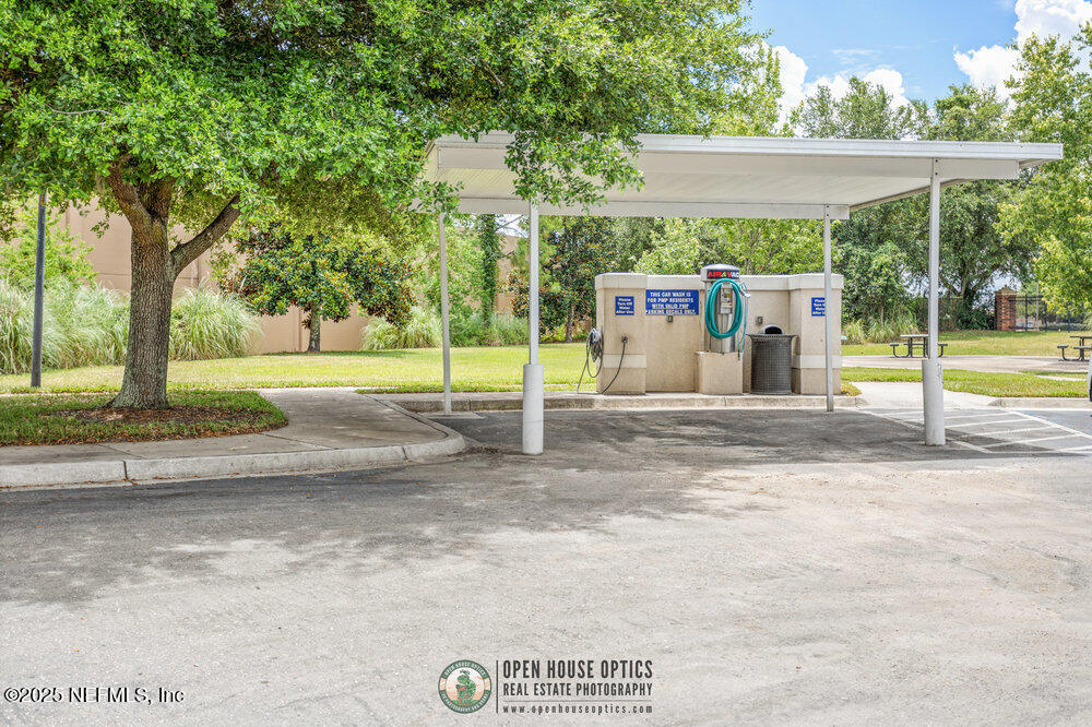 7801 Point Meadows Drive, Unit 3209 Jacksonville, FL 32256 - Photo 31 of 34 a view of a park with slide
