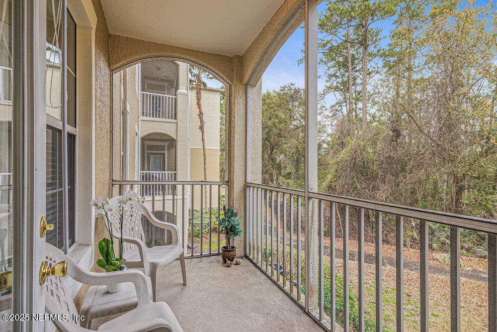 7801 Point Meadows Drive, Unit 3209 Jacksonville, FL 32256 - Photo 4 of 34 a view of balcony with furniture
