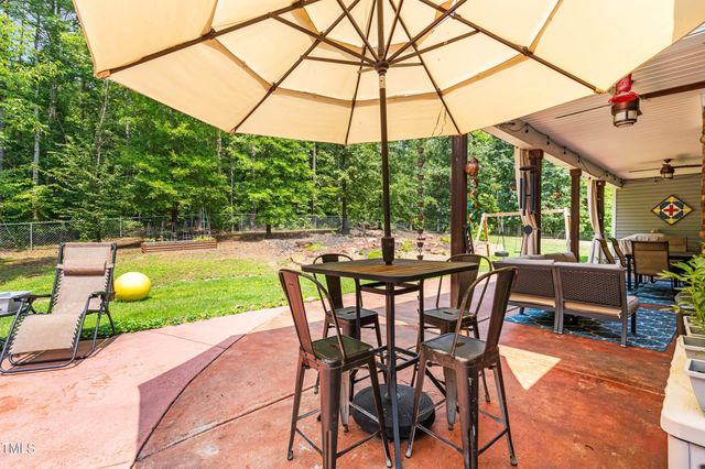 a view of a swimming pool with an outdoor space