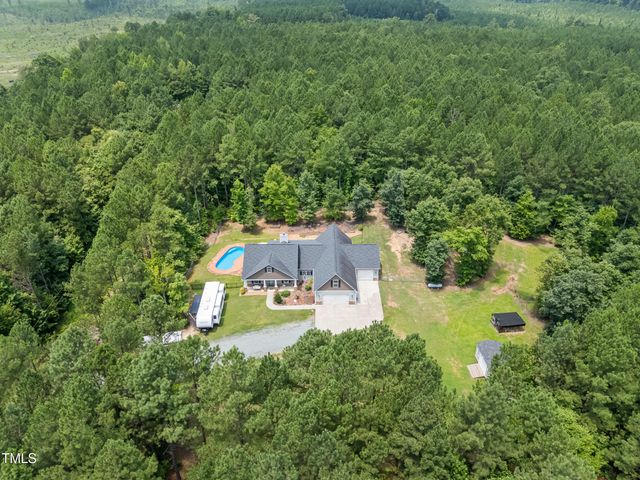 a view of a garden with a fountain
