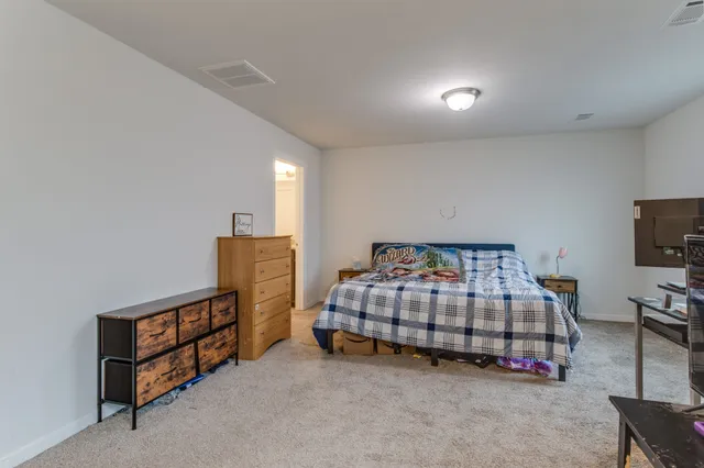a bathroom with a granite countertop sink mirror and double