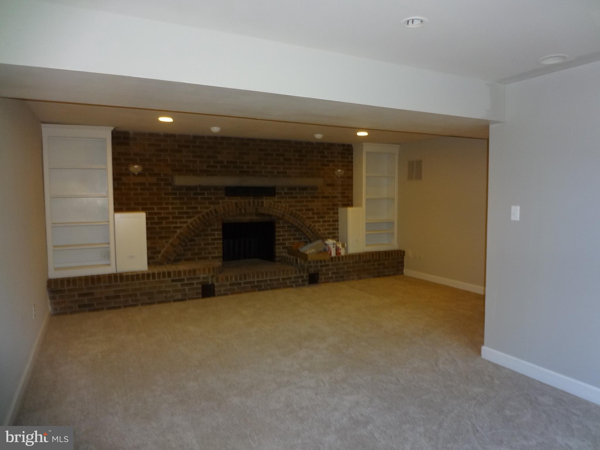 103 North Kennedy Road Sterling, VA 20164 - Photo 15 of 28 Cozy Brick Fireplace