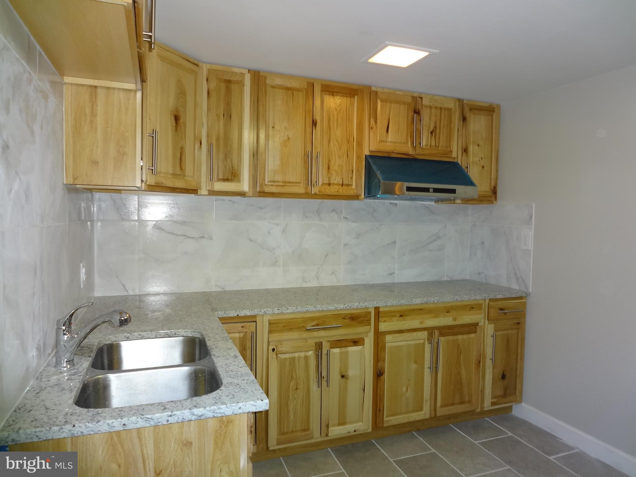 103 North Kennedy Road Sterling, VA 20164 - Photo 20 of 28 Basement Wetbar/kitchen