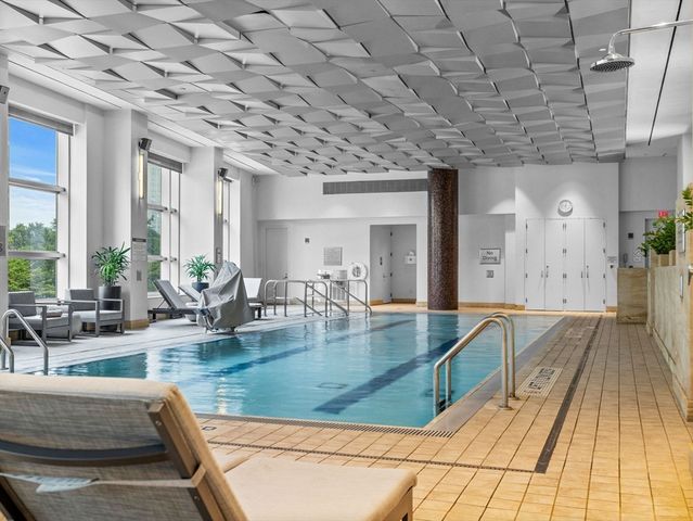 a view of a living room and kitchen floor