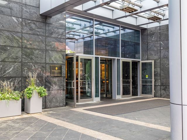 a front view of a building with lake view