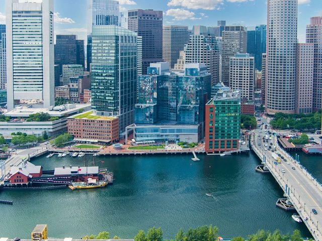 a view of a swimming pool with a garden