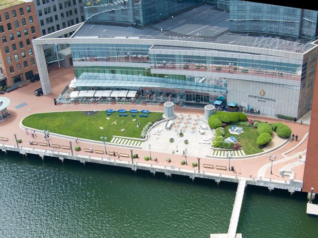 a view of a lake with tall buildings