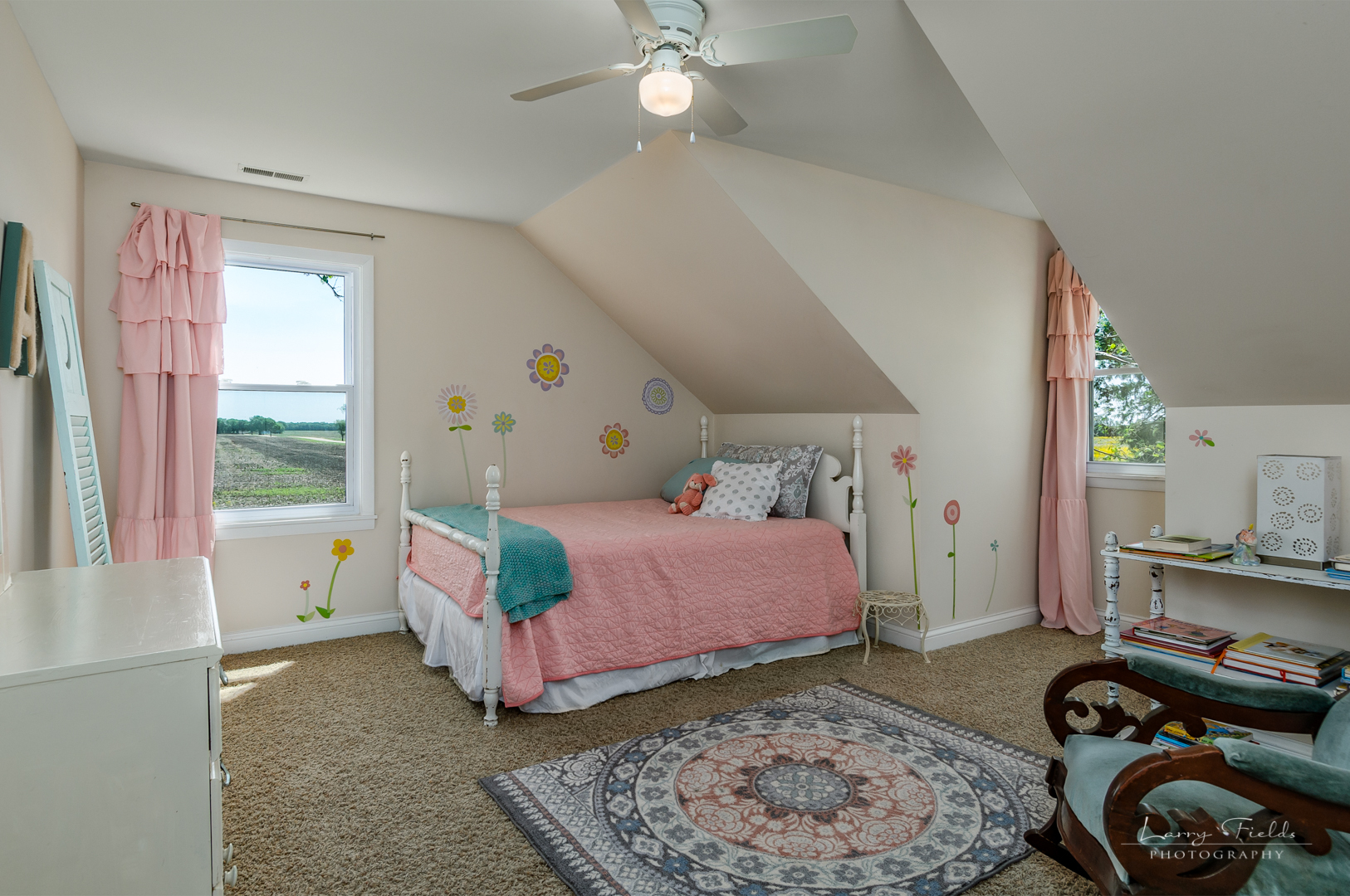14725 Sears Road Plano, IL 60545 - Photo 12 of 26 a bedroom with a bed dresser and a window