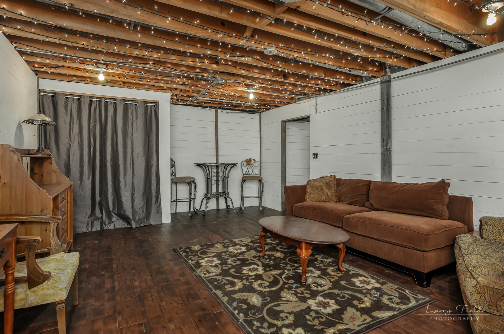 14725 Sears Road Plano, IL 60545 - Photo 18 of 26 a work room with furniture and wooden floor