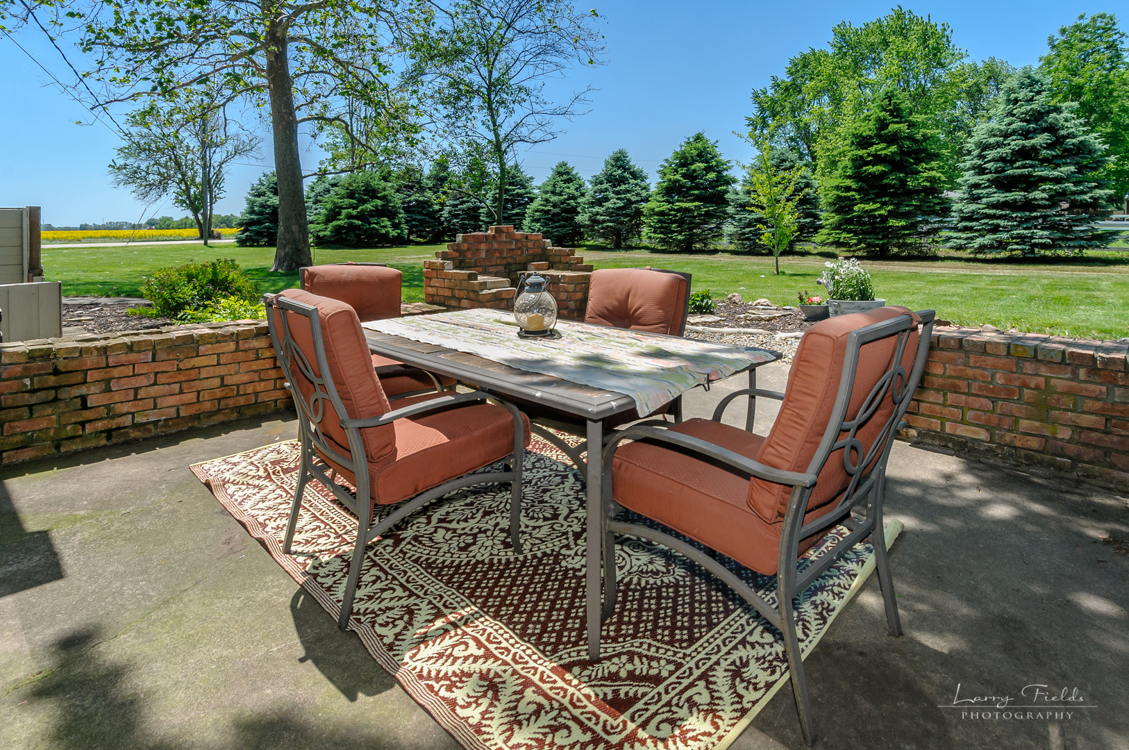 14725 Sears Road Plano, IL 60545 - Photo 22 of 26 a backyard of a house with outdoor seating