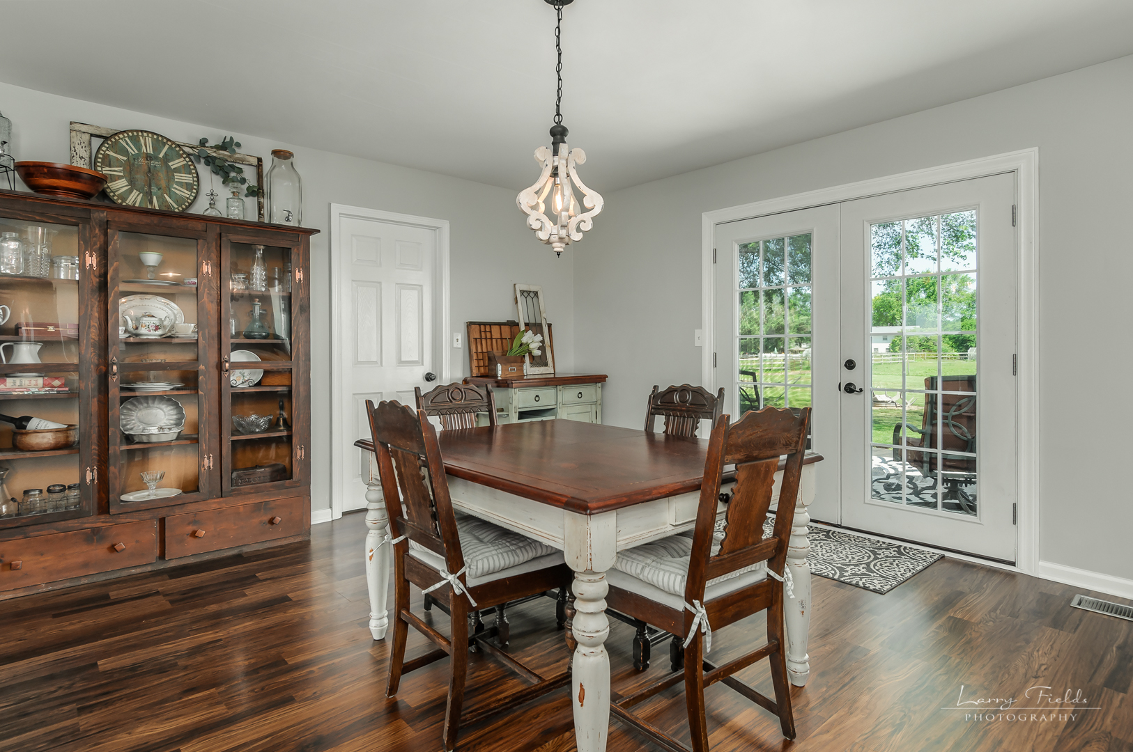 14725 Sears Road Plano, IL 60545 - Photo 6 of 26 a view of a dining room with furniture window and wooden floor