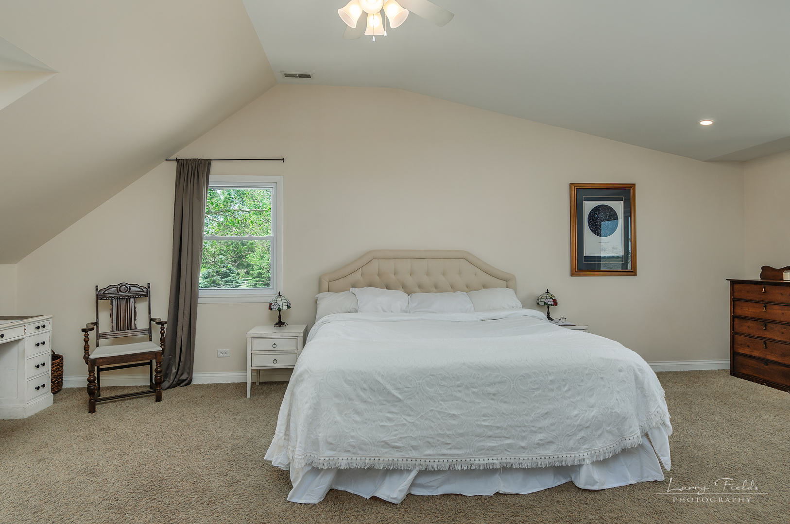 14725 Sears Road Plano, IL 60545 - Photo 10 of 26 a bedroom with a bed and a chair