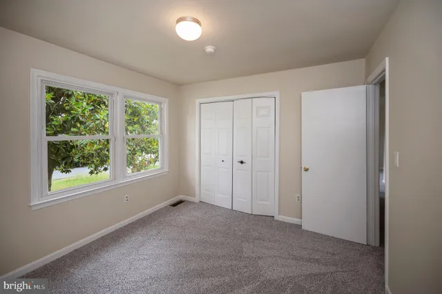 a bathroom with a tub and shower