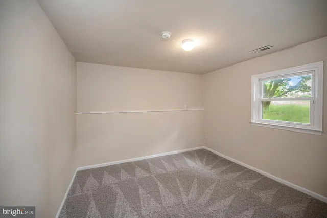 a bathroom with a shower and a toilet