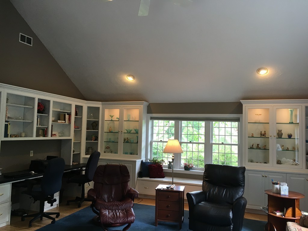 134 Kettle Hole Road Bolton, MA 01740 - Photo 11 of 29 a living room with furniture and a large window