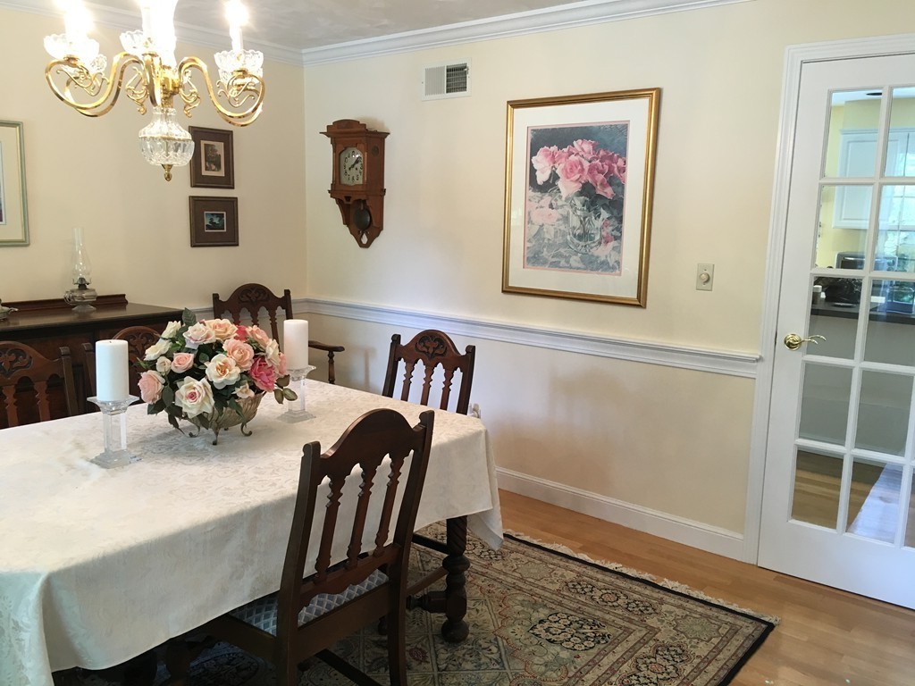 134 Kettle Hole Road Bolton, MA 01740 - Photo 12 of 29 a dining room with furniture and window