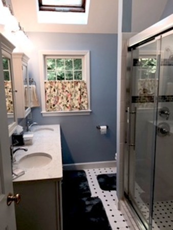134 Kettle Hole Road Bolton, MA 01740 - Photo 20 of 29 a bathroom with a sink a toilet and shower