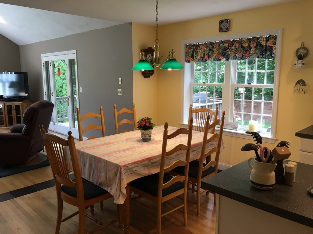 134 Kettle Hole Road Bolton, MA 01740 - Photo 8 of 29 a dining room with furniture and window