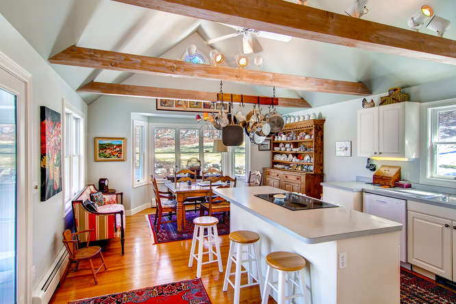 19 North Tabor Farm Road Chilmark, MA 02535 - Photo 5 of 24 Bright and open dining room and kitchen.
